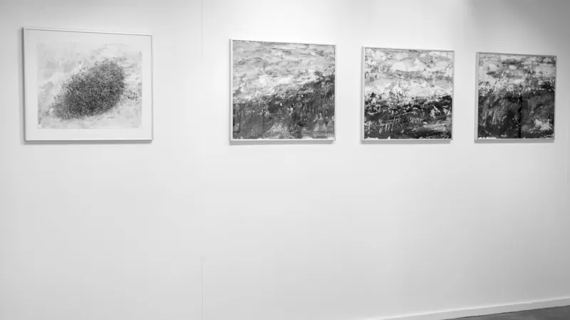 A sequence of small framed prints