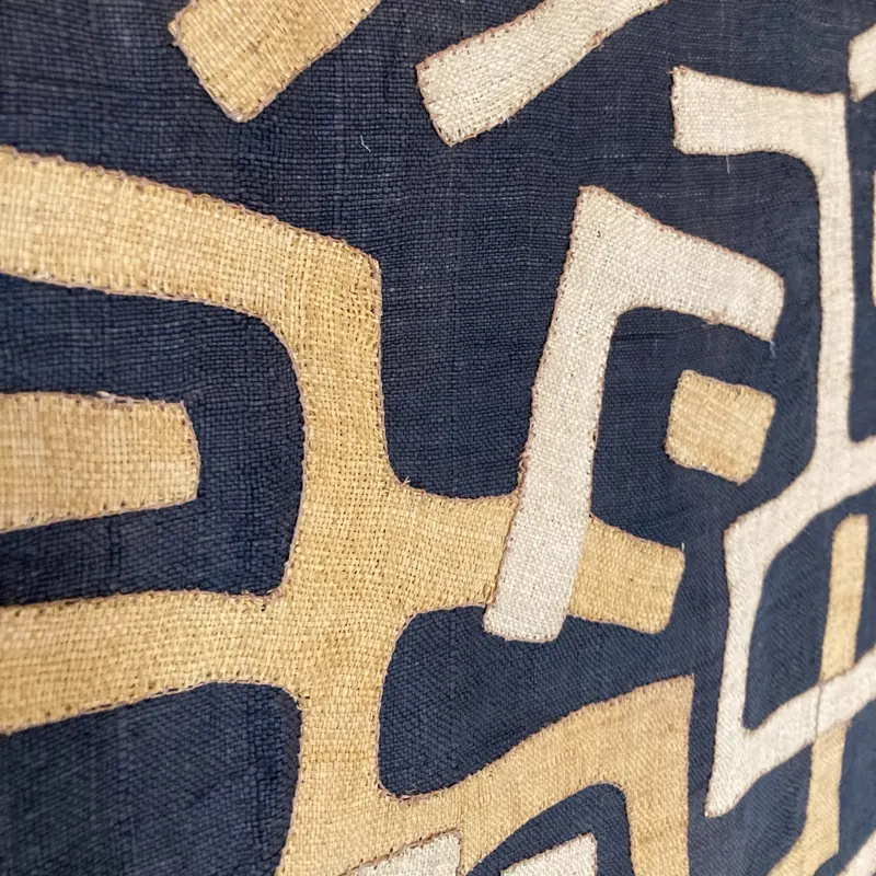 Detail of a Kuba raffia textile in indigo and cream