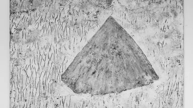 Large rubbing of a triangular form among grasses
