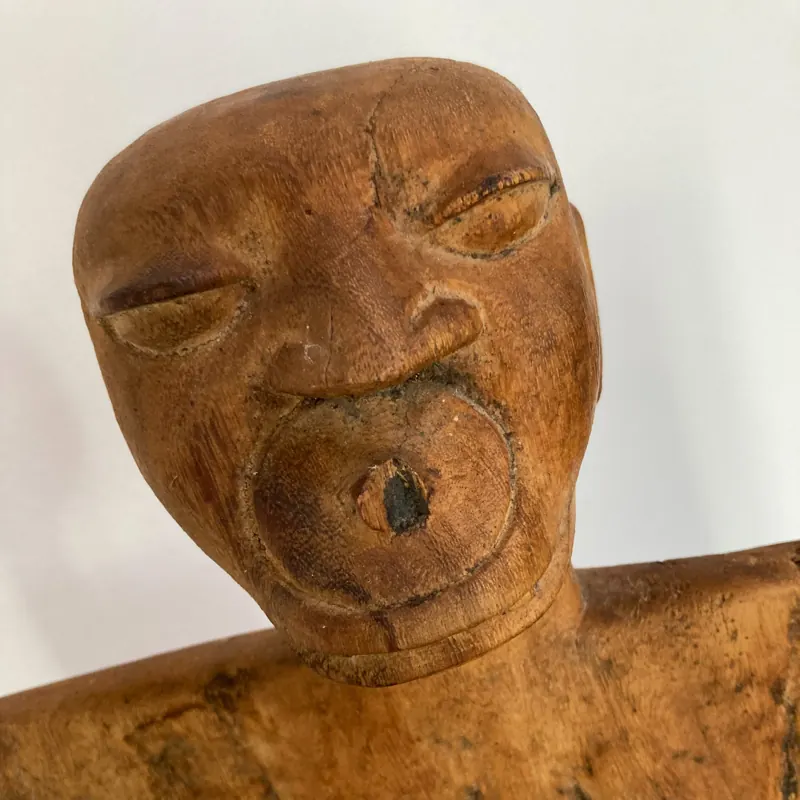 Close-up of a carved wooden face